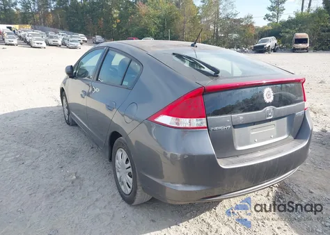 2011 Honda Insight z USA, uszkodzony, nr VIN JHMZE2H36BS008807